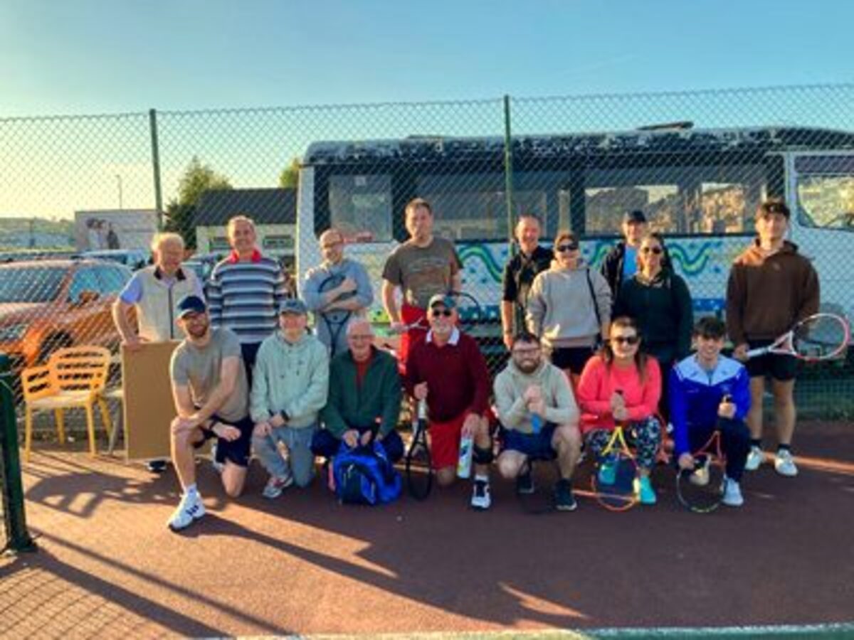 Members gathered at the courts on a summer evening after social tennis